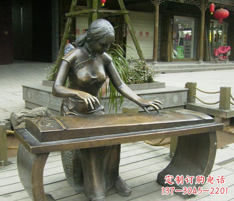 西安铜雕现代人物弹古筝雕塑