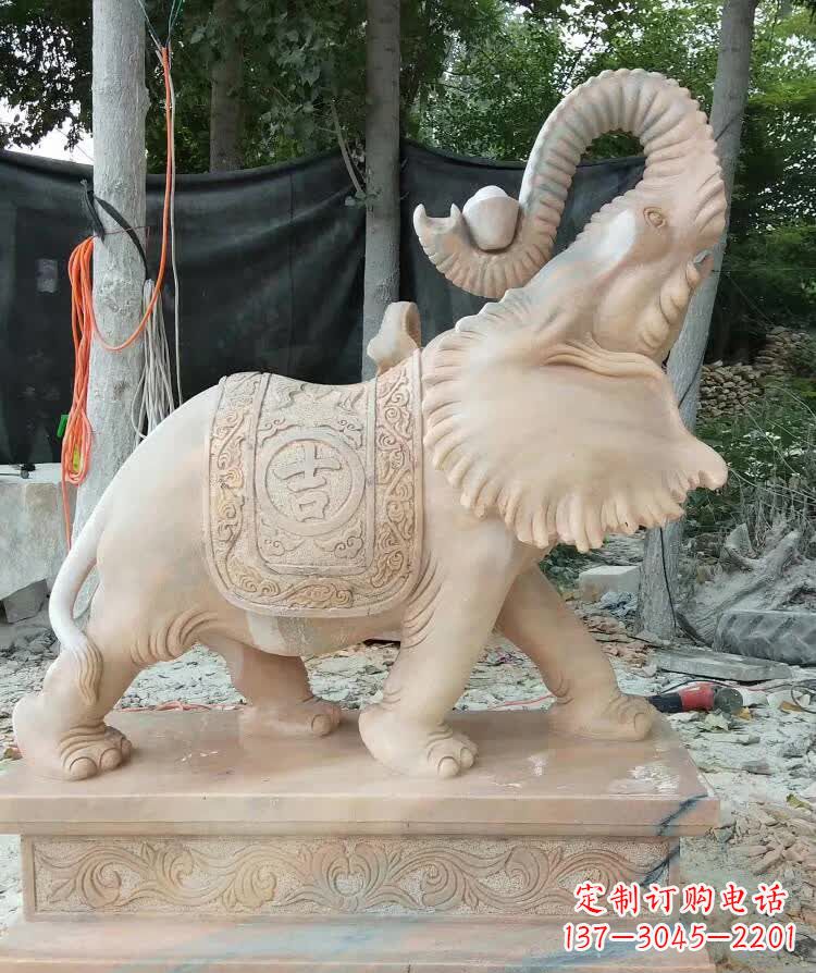 西安晚霞红卷元宝大象雕塑